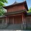 陈建国，考古学副研究员，中年男性，专注庞贝城考古材料分析，工作场景背景